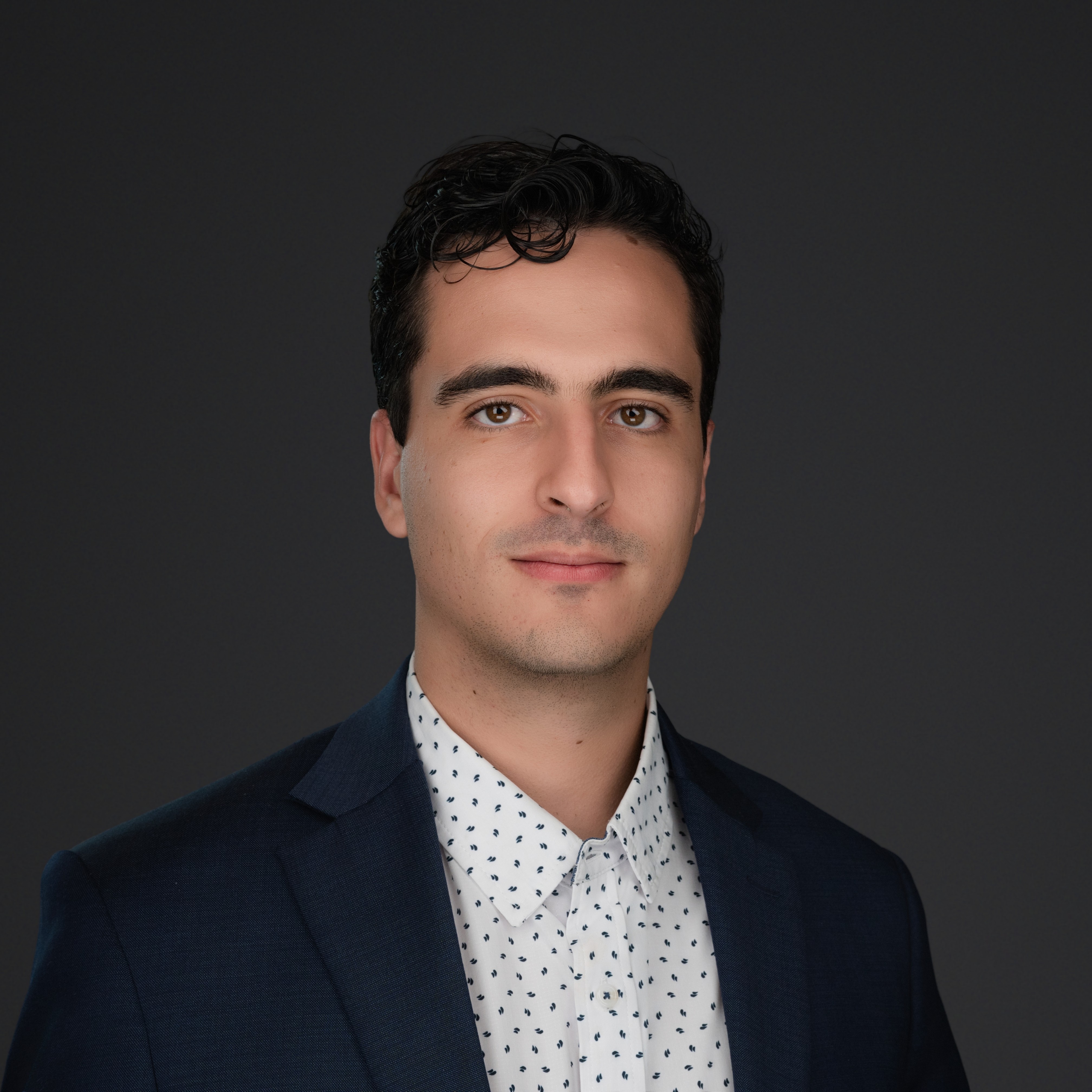 Ernesto Sola-Thomas, professional headshot